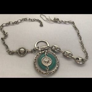 Silver Turquoise pendant with long chain.